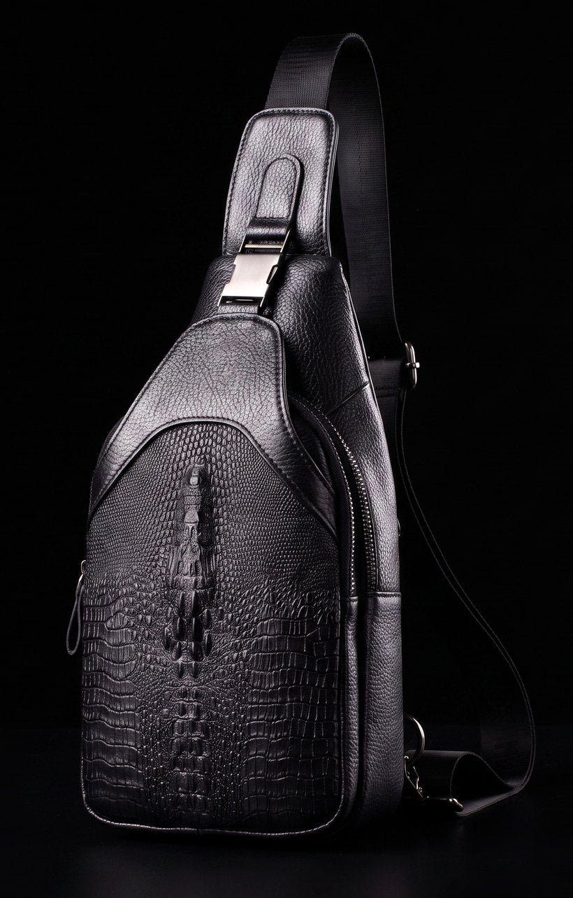 The CAIMAN crossbody sling, front three-quarter view